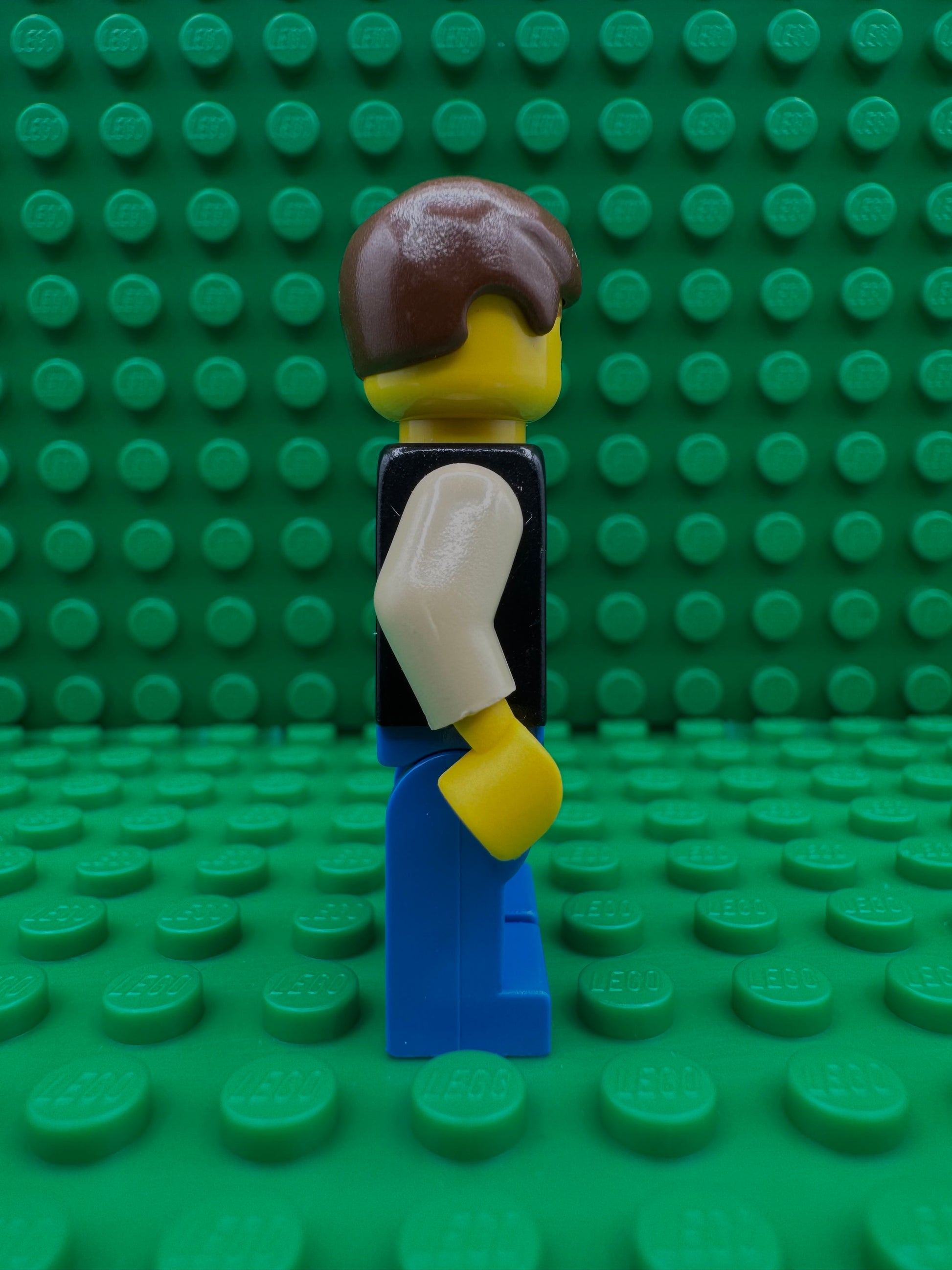 sw0014 Han Solo - Yellow Head, Black Vest over Tan Shirt, Blue Legs with Belts
