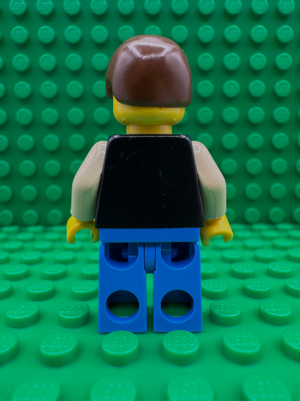 sw0014 Han Solo - Yellow Head, Black Vest over Tan Shirt, Blue Legs with Belts