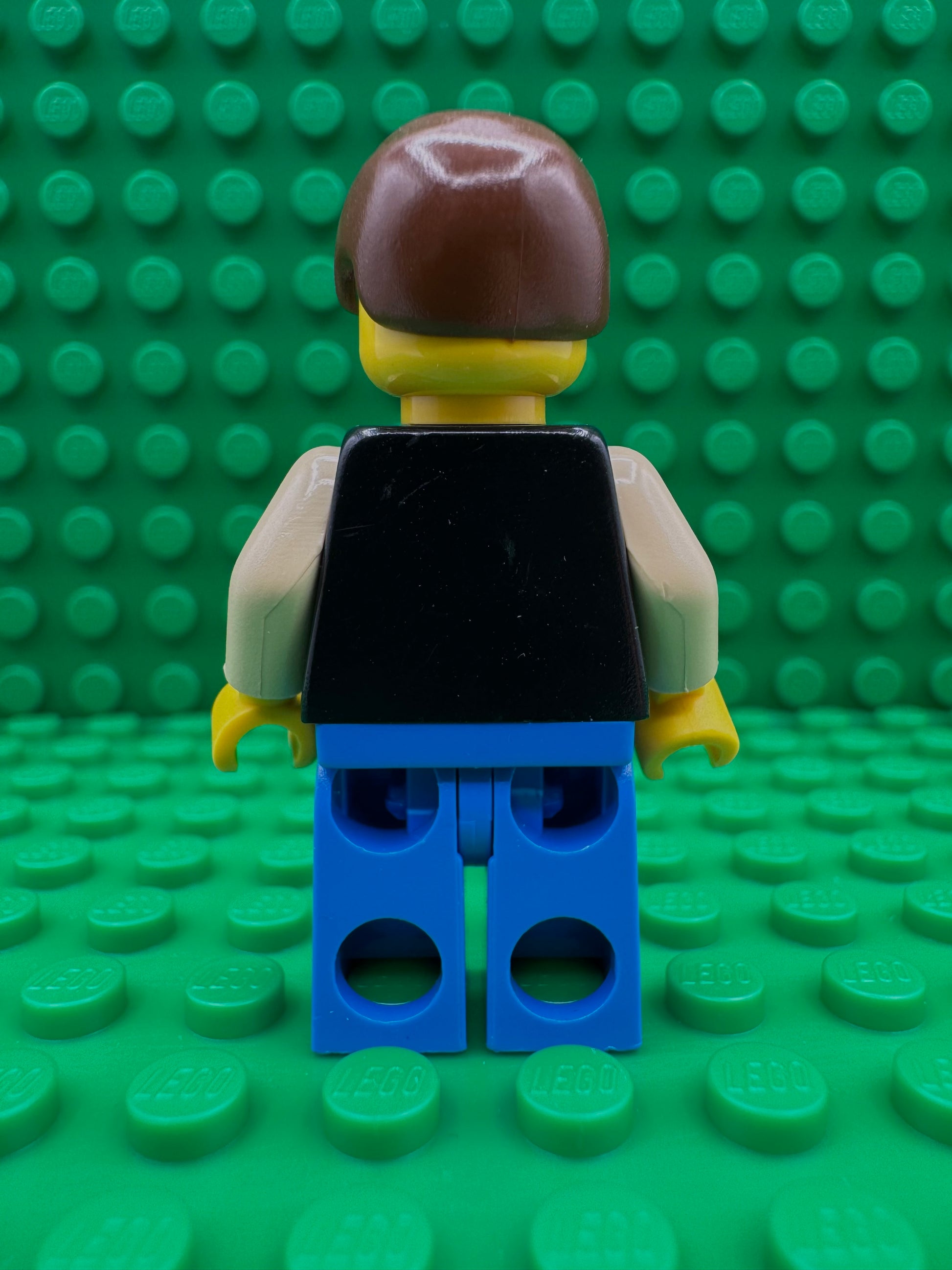 sw0014 Han Solo - Yellow Head, Black Vest over Tan Shirt, Blue Legs with Belts