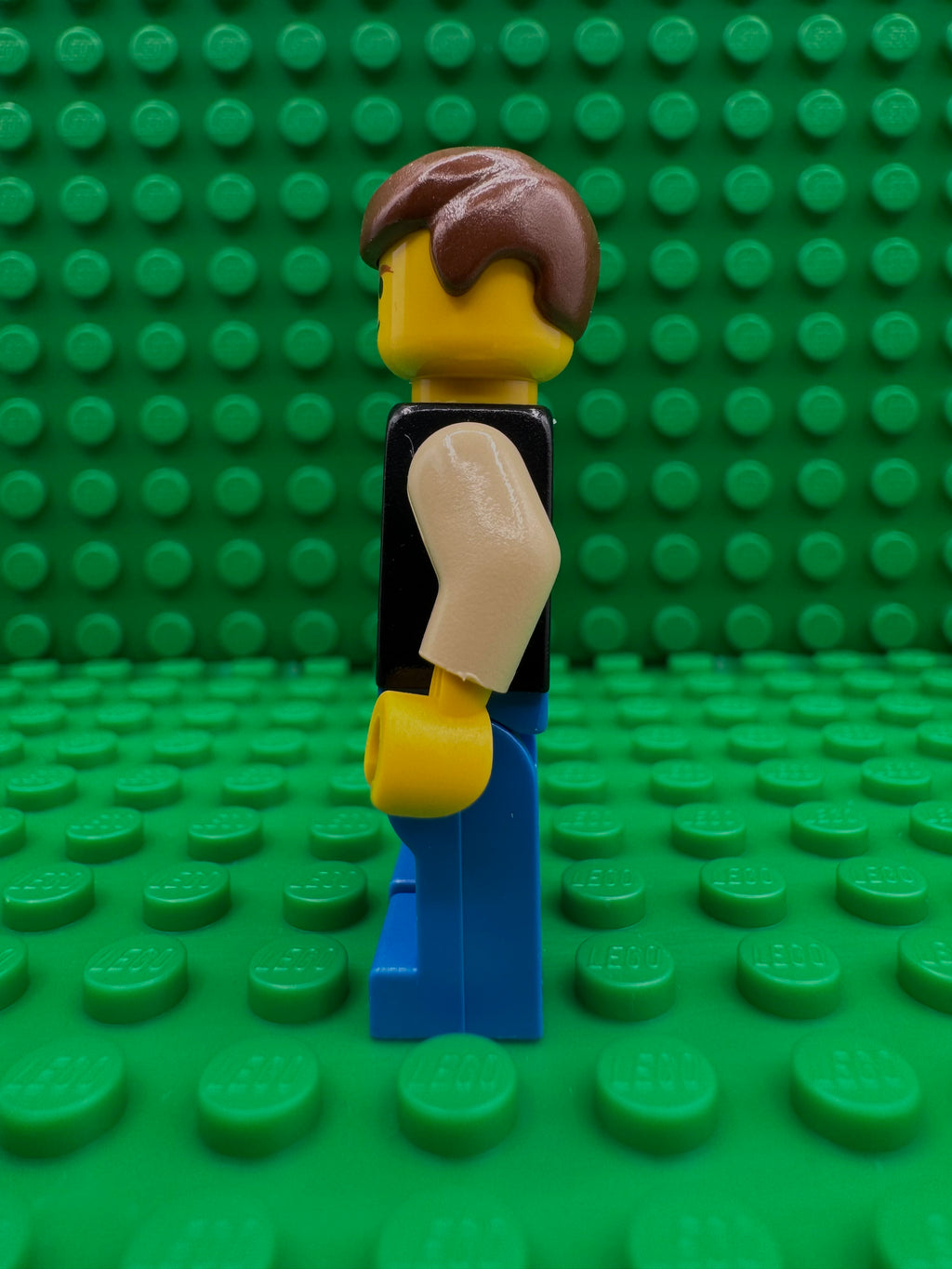 sw0014 Han Solo - Yellow Head, Black Vest over Tan Shirt, Blue Legs with Belts